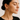 Woman wearing sterling silver hoop earrings